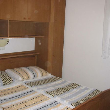 Apartmani Manuela Lopar Phòng bức ảnh
